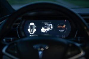 Elon Musk's Tesla reports unchanged bitcoin holdings, books $173 million digital asset loss