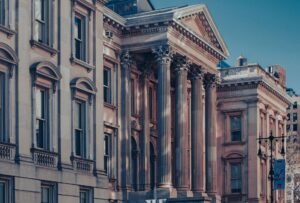 Goldman, Citi, UBS Join 21-Firm Push for Dollar Stablecoin by 2027