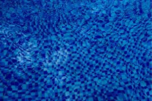 Why a Liquidity Pool Can Earn Fees and Still Trail Holding